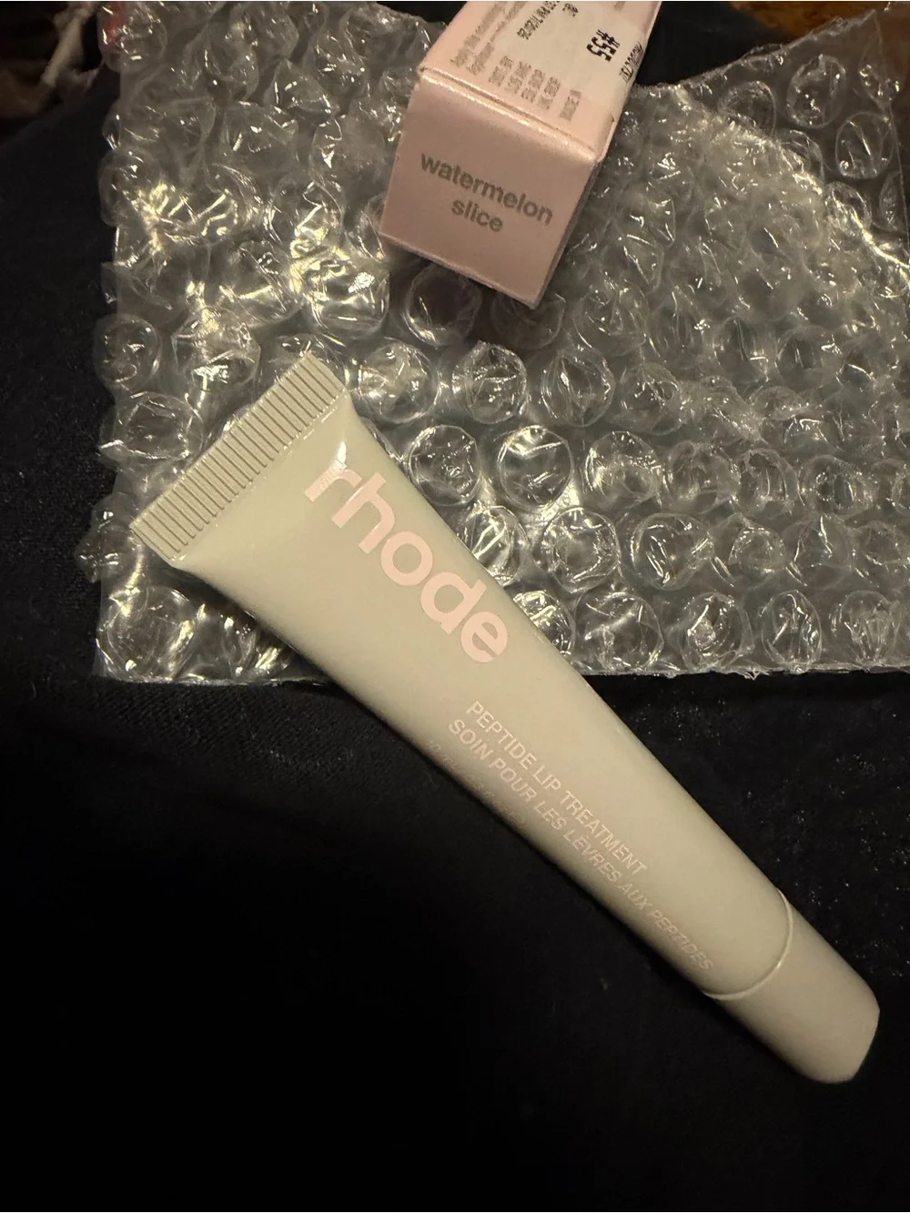 RHODE Peptide Lip Treatment in Pale Mint Tube
